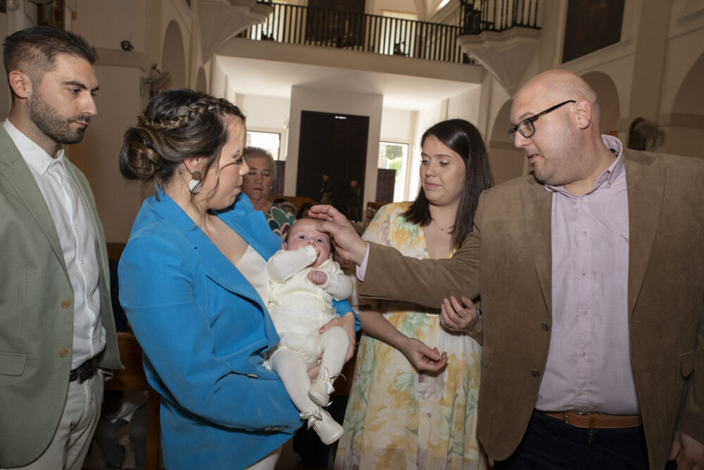 Padres y padrinos con Manuel, bautizo